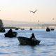 Sports fishermen congregate in Tillamook Bay.